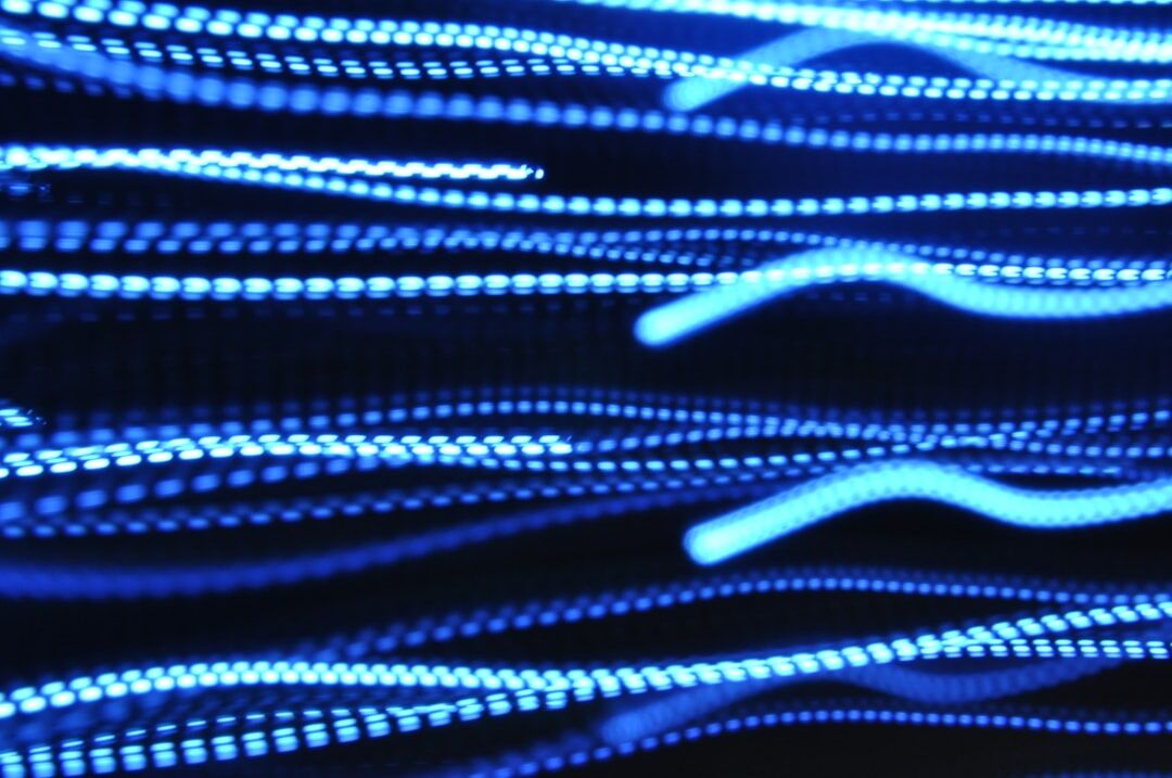 Abstract AI data visualization with glowing blue particles